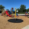 12ft diameter modular rubber wear mat on a playground