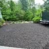 Play zone with trampoline and brown rubber mulch