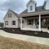 Rubber Mulch garden bed landscaping in front of house