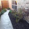 Brown Rubber Mulch Landscaping Side of House