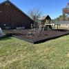 Playground Ground Surface of Brown Rubber Mulch and DuraTimber Borders 