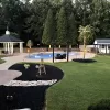 Black Rubber Mulch Backyard Landscaping After Photo