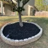 Black rubber mulch tree ring