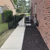 Rubber mulch in side yard next to house