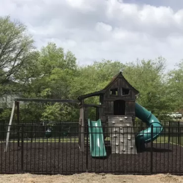 Church playground with rubber mulch surfacing