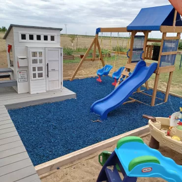 Playground with blue rubber mulch 