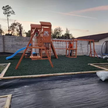 Backyard Oasis Playground with Green Rubber Mulch