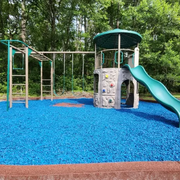 Playground with blue rubber mulch