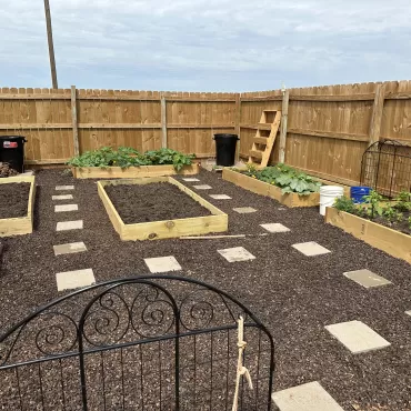 Raised Garden With Brown Rubber Mulch Ground Cover