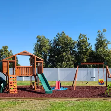 Playground with red rubber mulch