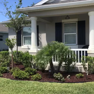 Home landscaping front yard project with rubber mulch