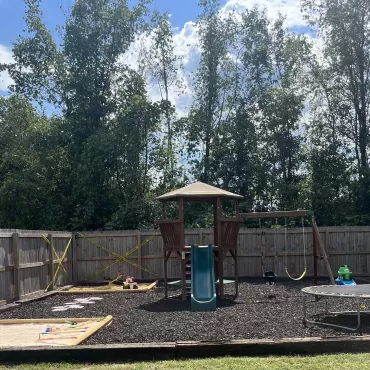 Playground with Brown Rubber Mulch Surfacing