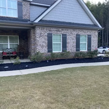 Black Rubber Mulch Landscaping All the Way Around House