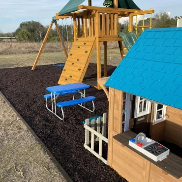 Home playground with rubber mulch