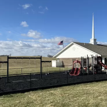 Black rubber mulch ground cover used in church playground