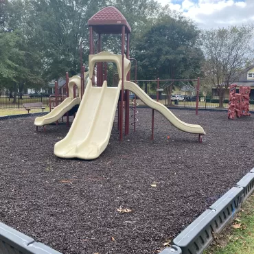 Church Playground With Brown Rubber Mulch Corner View