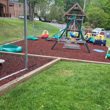Church Playground with Red Rubber Mulch Ground Covering