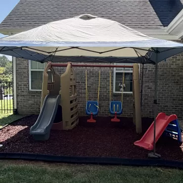 Red Rubber Mulch Replaces Grass Ground Covering