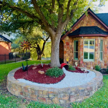 Red Landscape Rubber Mulch in Front Yard