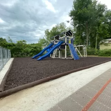 Church Playground with Brown Rubber Mulch