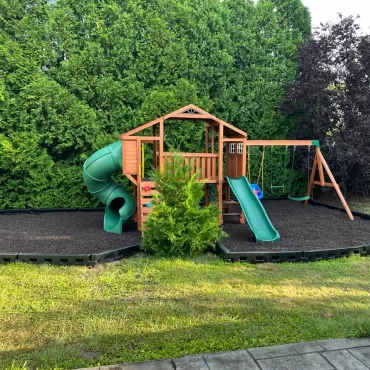 Playground with Brown Rubber Mulch and DuraTimber Borders