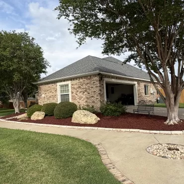 Red Rubber Mulch Landscaping in Front Yard