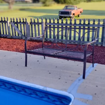 Pool with Red Rubber Mulch Surrounding