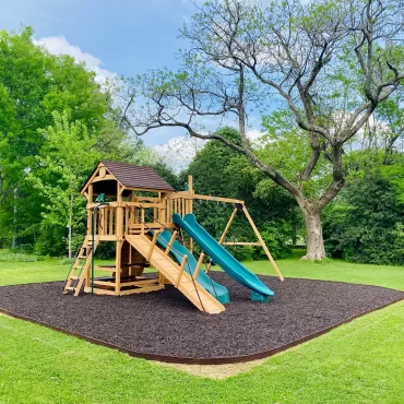 Playground with brown rubber mulch surfacing