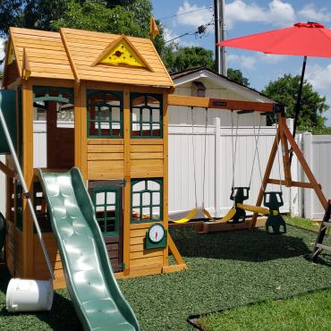 Playground with green rubber mulch 