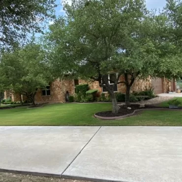 Curvy tree islands with rubber mulch