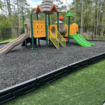 Playground with natural rubber mulch