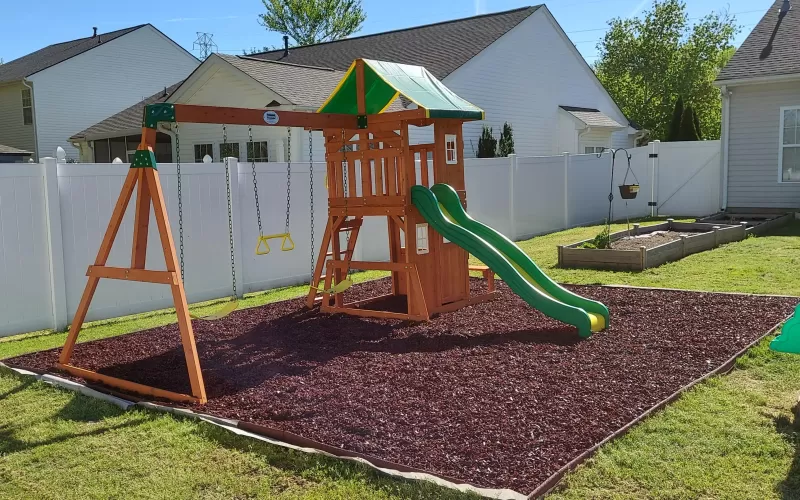 Playground with red rubber mulch
