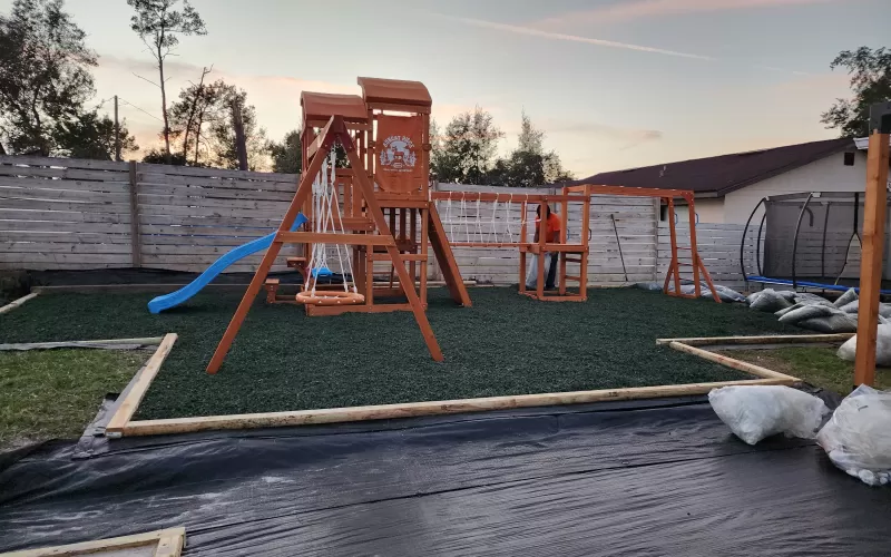 Backyard Oasis Playground with Green Rubber Mulch