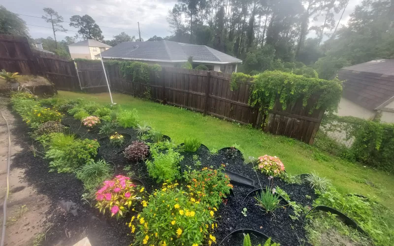 Rubber mulch landscaping on a slope