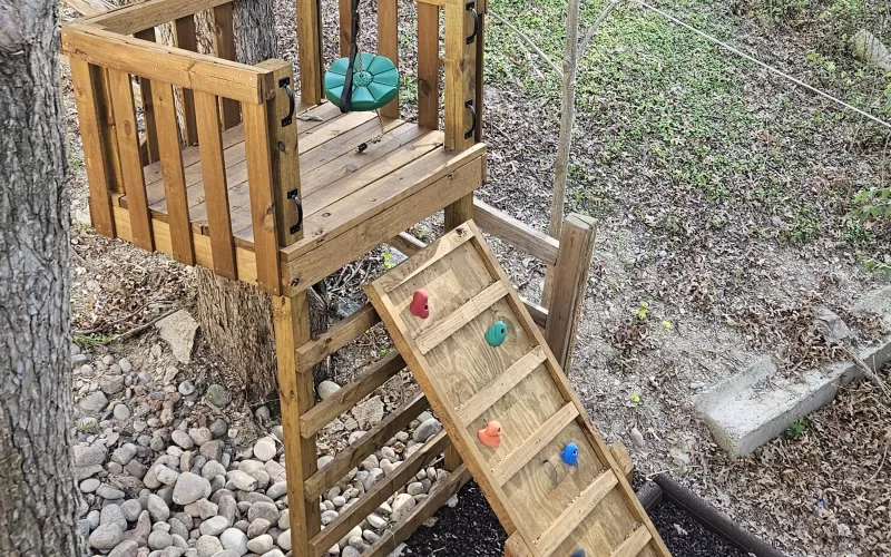 Brown Rubber Mulch Under Zip Line