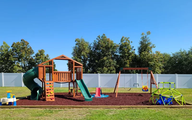 Playground with red rubber mulch