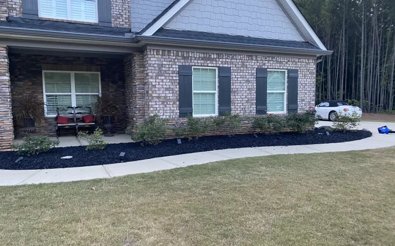 Black Rubber Mulch Landscaping All the Way Around House