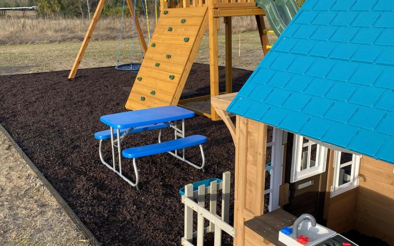 Home playground with rubber mulch