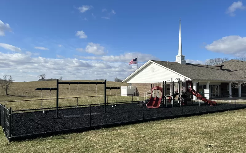 Black rubber mulch ground cover used in church playground