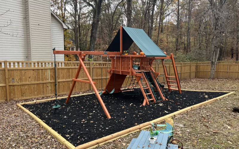 Playground with Black Rubber Mulch in the Fall