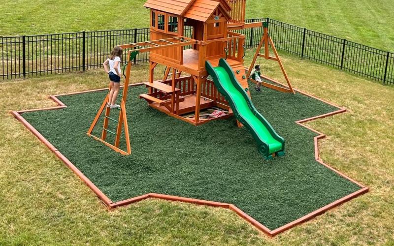 Playground with Green Rubber Mulch Ground Covering