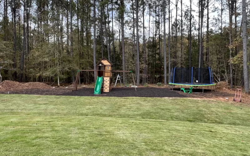 Kids Playground With Brown Rubber Mulch