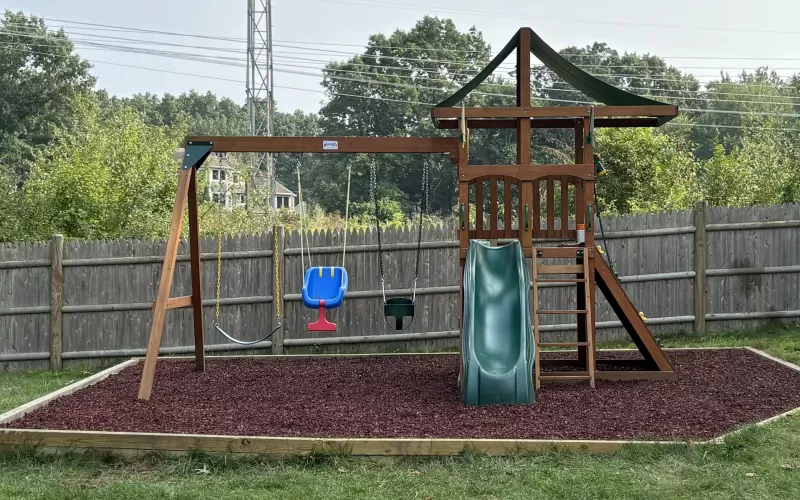 Swing Set with Red Rubber Mulch Safety Surfacing