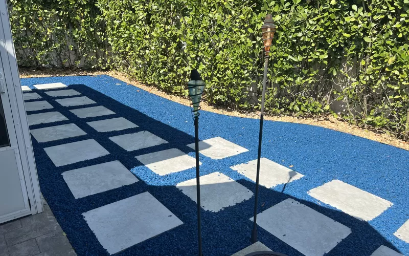 Large Pavers with Blue Rubber Mulch in Between