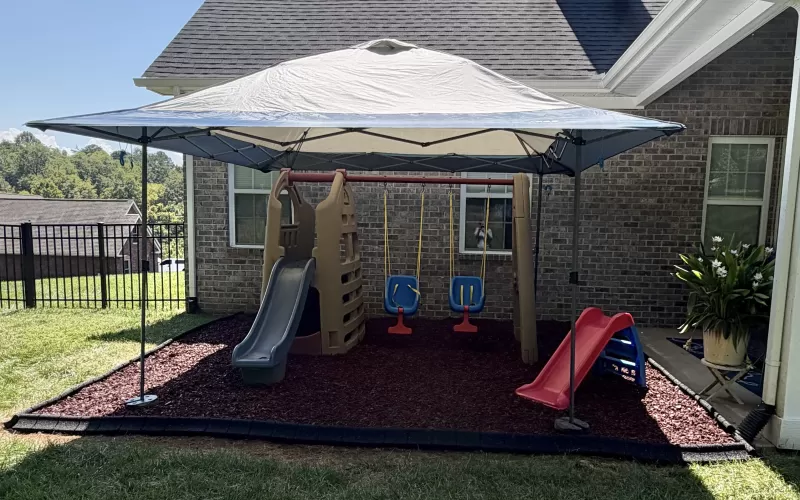 Red Rubber Mulch Replaces Grass Ground Covering