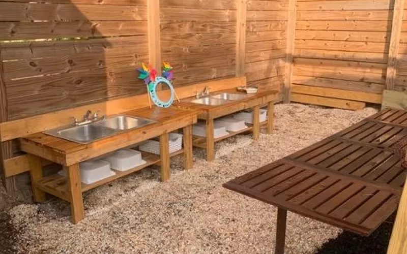 Rubber Mulch Next To Rock 