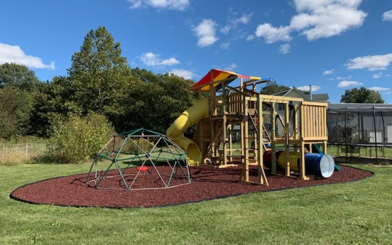 Playground and Climbing Dome with Red Rubber Mulch