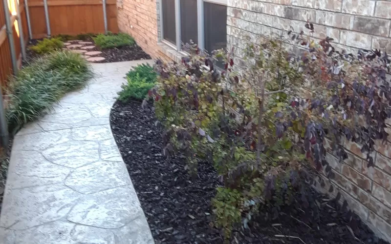 Brown Rubber Mulch Landscaping Side of House