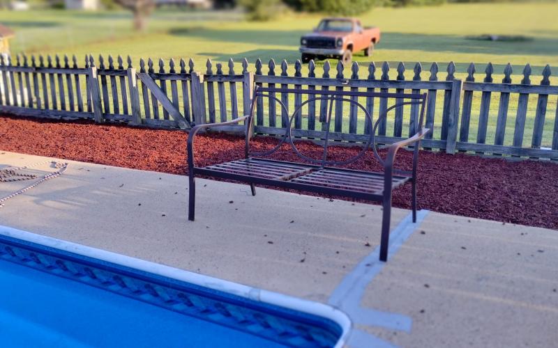 Pool with Red Rubber Mulch Surrounding