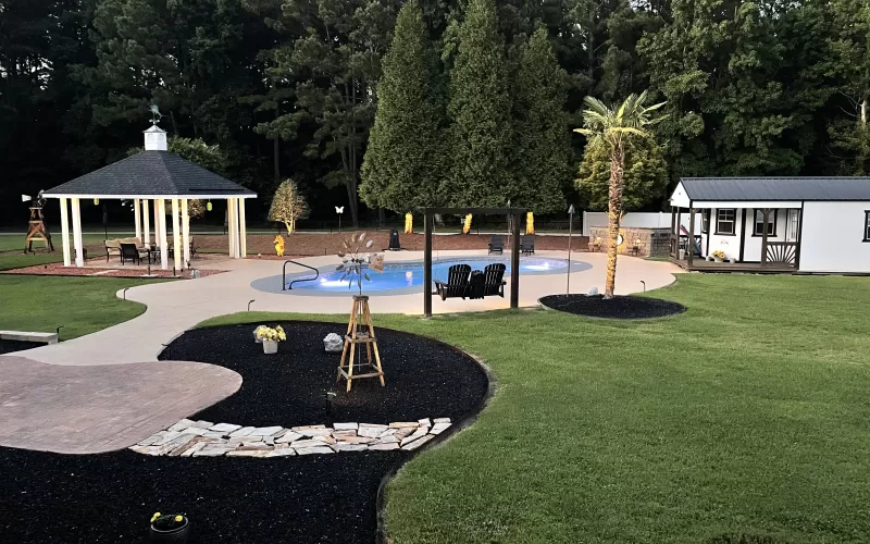 Black Rubber Mulch Backyard Landscaping After Photo